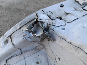 Front right quarter panel of a Chevrolet Equinox 18-24 on the body, white, with tears in the fasteners