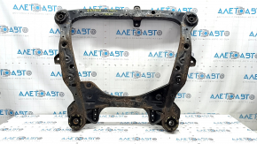 The front subframe of a Toyota Camry V50 12-14 USA is rusty and the silent blocks are cracked.