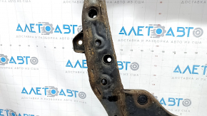 The front subframe of a Toyota Camry V50 12-14 USA is rusty and the silent blocks are cracked.