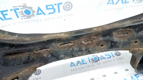 The front subframe of a Toyota Camry V50 12-14 USA is rusty and the silent blocks are cracked.