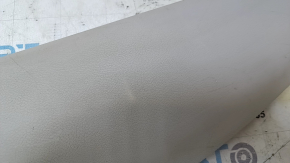 Upper trim of the trunk door of the Nissan Leaf 13-17 is gray, scratches, needs cleaning, the plastic has turned white