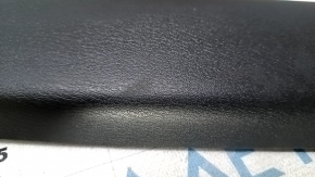 Upper trunk door trim for a Nissan Pathfinder 13-20, black, scratched, worn