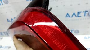 Left outer fender light for a 2023-2024 Kia Niro with trim, scratches, cracks