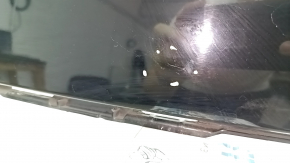 The bare lower rear bumper of a Volvo XC90 16-23 for parking sensors, black, scratches, dented, broken mount