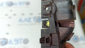 The front bumper mount on the right fender of a Kia Niro 23-24 is broken.