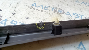 Upper trim of the trunk door of the Toyota Sequoia 2008-2016, black, scratched, bulging plastic