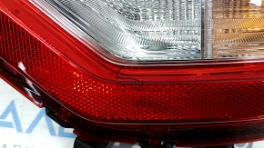 Kia Niro 23-24 halogen right rear bumper light, debris under the glass, broken connector mount