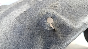 The rear right fender liner of a Toyota Prius 50 16-22 has torn fasteners.
