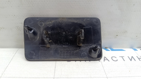 The front bumper headlight washer cap, left, Polestar 2 21-25, is worn out.