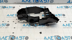 The Lexus RX350 16-22 underhood fuse box housing has a broken mount.