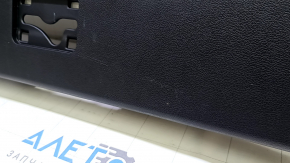 The lower trim of the trunk door of a Toyota Prius 50 16-22 is black, worn, and the plug is missing.