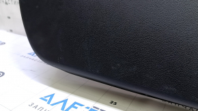 The lower trim of the trunk door of a Toyota Prius 50 16-22 is black, worn, and the plug is missing.