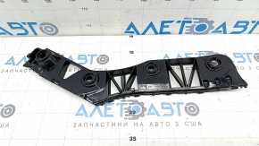 The rear bumper mount, outer right, VW Tiguan 18-24, is broken.