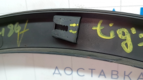 Front right fender arch trim for VW Tiguan 22-24. Structure. Scratches, broken fasteners.