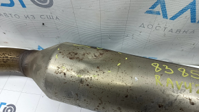 The exhaust pipe with a catalytic converter for a Toyota Rav4 19-22 hybrid, USA built, is dented.