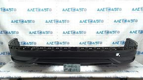 The rear bumper is bare, the lower part of the VW Tiguan 22-24, the structure is without parking sensors, it is torn, the fasteners are broken, there are scratches.