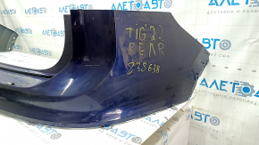 The rear bumper, bare upper part, VW Tiguan 18-24 blue LC5B, in glue, broken fasteners