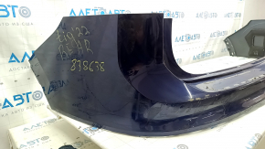 The rear bumper, bare upper part, VW Tiguan 18-24 blue LC5B, in glue, broken fasteners