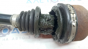The rear right axle shaft assembly for a Polestar 2 21-25 is broken, the anthers are torn, and it is rusty.