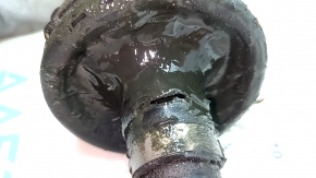 The rear right axle shaft assembly for a Polestar 2 21-25 is broken, the anthers are torn, and it is rusty.