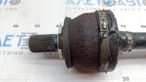 The rear right axle shaft assembly for a Polestar 2 21-25 is broken, the anthers are torn, and it is rusty.