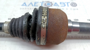 The rear right axle shaft assembly for a Polestar 2 21-25 is broken, the anthers are torn, and it is rusty.