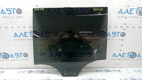 Rear left door glass of Ford Explorer 20-23, tinted, scratches