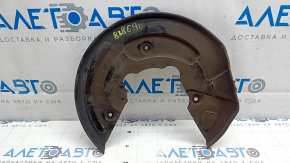 The front left brake disc cover for a Polestar 2 21-25 is dented and bent.