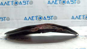 The front right brake disc cover for a Polestar 2 21-25 is dented and bent.