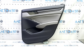 The rear right door panel for the 18-18 Honda Accord is black, with a gray leather insert, the armrest is gray leather, and the molding is gray wood.