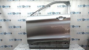 Bare front left door of Ford Explorer 20-23 silver JS, dents, bump