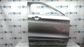 Bare front right door of a 2023 Ford Explorer, silver JS, dents, bumps, scratches