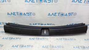 VW Tiguan 18-24 trunk opening trim, black, broken fasteners, needs cleaning