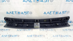 VW Tiguan 18-24 trunk opening trim, black, broken fasteners, needs cleaning