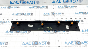 Upper trim of the tailgate of Ford Explorer 20-23, black, worn, crack in the fastener