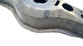 The lower control arm under the rear left spring of a Toyota Prius 50 Prime 16-22 is rusty, the silent block needs replacing