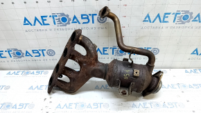 The exhaust manifold with a catalytic converter for a Toyota Prius 50 16-21 is rusty and has a broken bolt.
