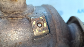 The exhaust manifold with a catalytic converter for a Toyota Prius 50 16-21 is rusty and has a broken bolt.