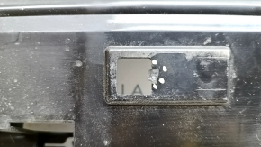 The foot-operated trunk opening sensor assembly for the Polestar 2 21-25 has broken fasteners.