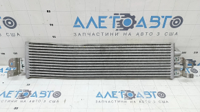 The oil cooler radiator of the VW Tiguan 18-24 is bent.