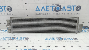 The oil cooler radiator of the VW Tiguan 18-24 is bent.