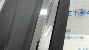 Lower rear left door trim for Ford Explorer 20-23 with chrome molding, scratches