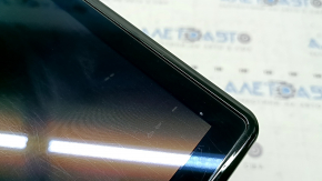 The Ford Explorer 2020-23 navigation display is worn and scratched.