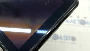 The Ford Explorer 2020-23 navigation display is worn and scratched.