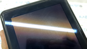 The Ford Explorer 2020-23 navigation display is worn and scratched.