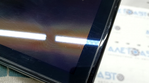 The Ford Explorer 2020-23 navigation display is worn and scratched.