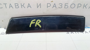 The front right roof lining for a Polestar 2 21-25 has worn paint.