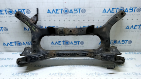 The rear subframe of a Toyota Prius 50 16-22 FWD is rusty and filed.