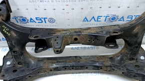 The rear subframe of a Toyota Prius 50 16-22 FWD is rusty and filed.