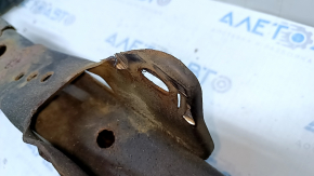 The rear subframe of a Toyota Prius 50 16-22 FWD is rusty and filed.